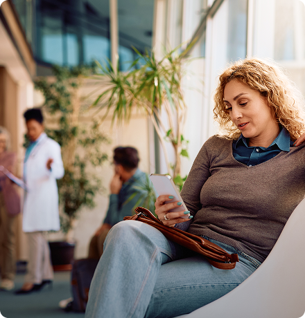 Woman using mobile check-in for health checkup